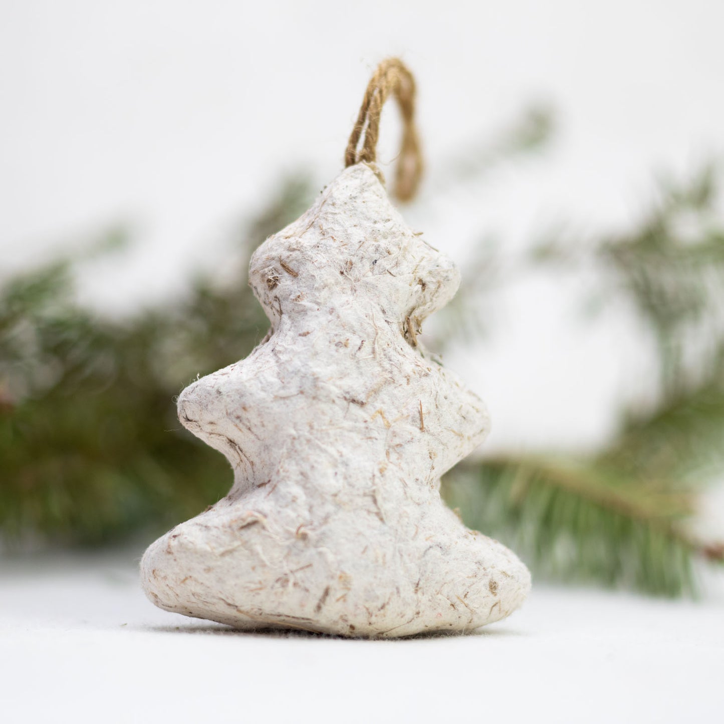 eco-friendly ornaments shaped like christmas trees in white