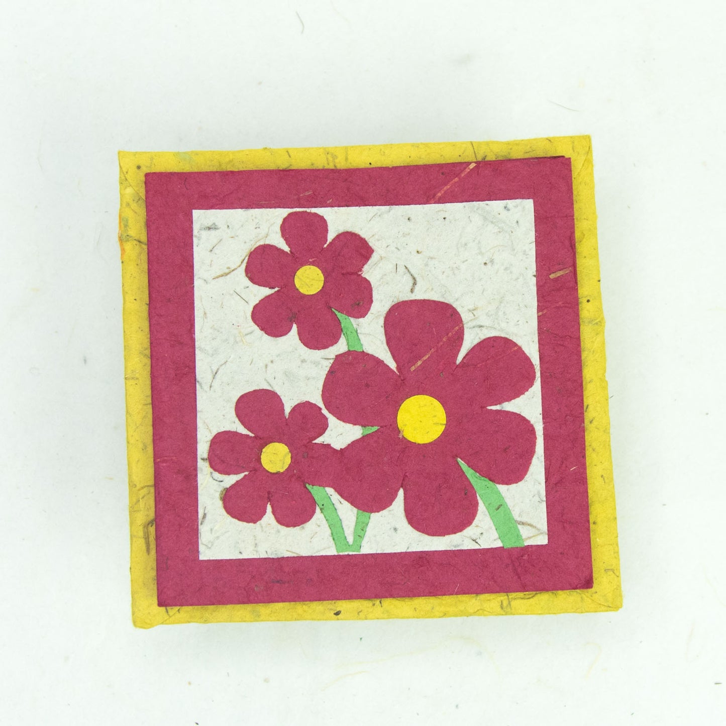 eco-friendly greeting card - 3 pink flowers on top of eco-friendly envelope